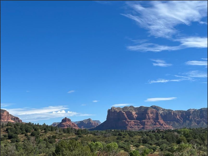 View of mountains with green  landscaping in fore front