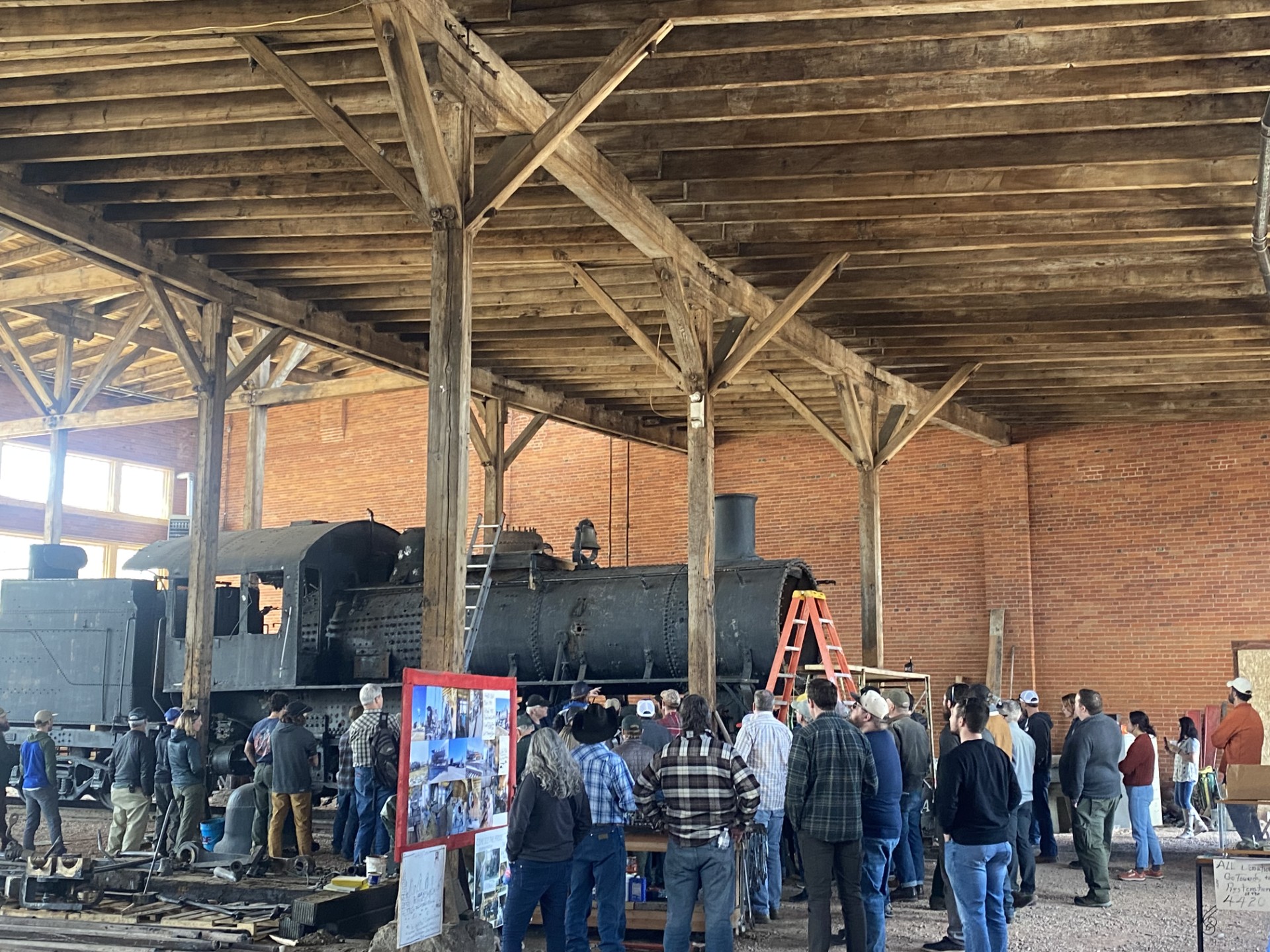 People gathered around historic train