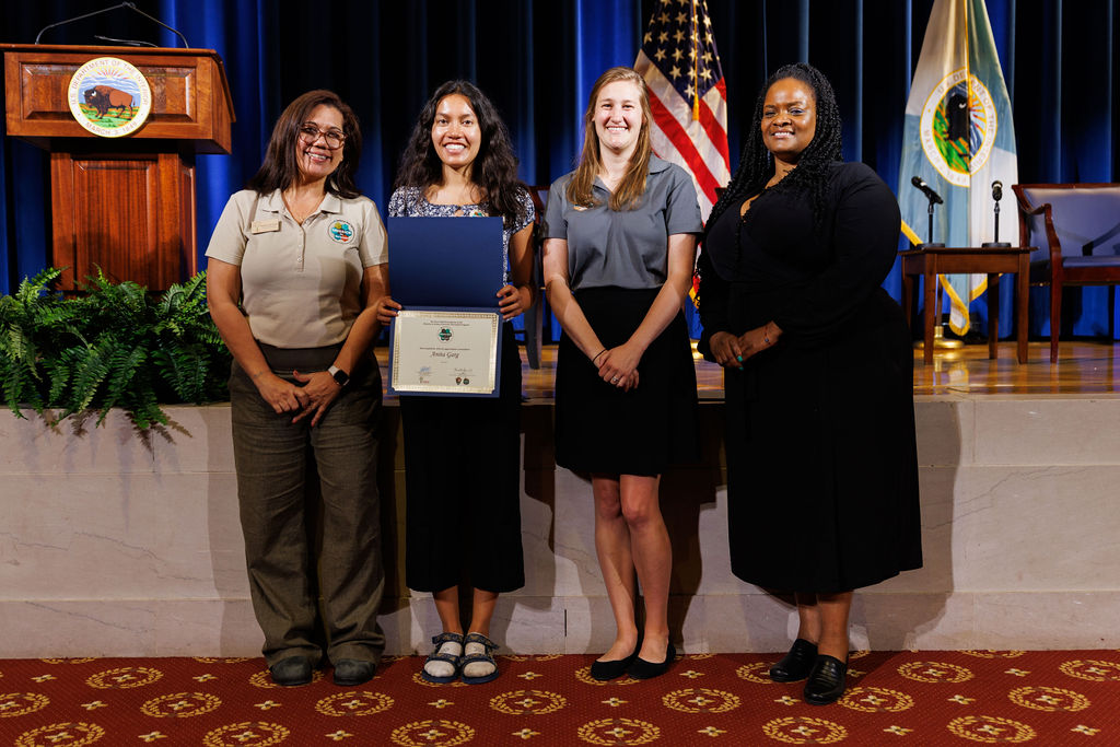 Anita Garg, Biology Assistant, at Yosemite National Park receiving an award in Washington, D.C.
