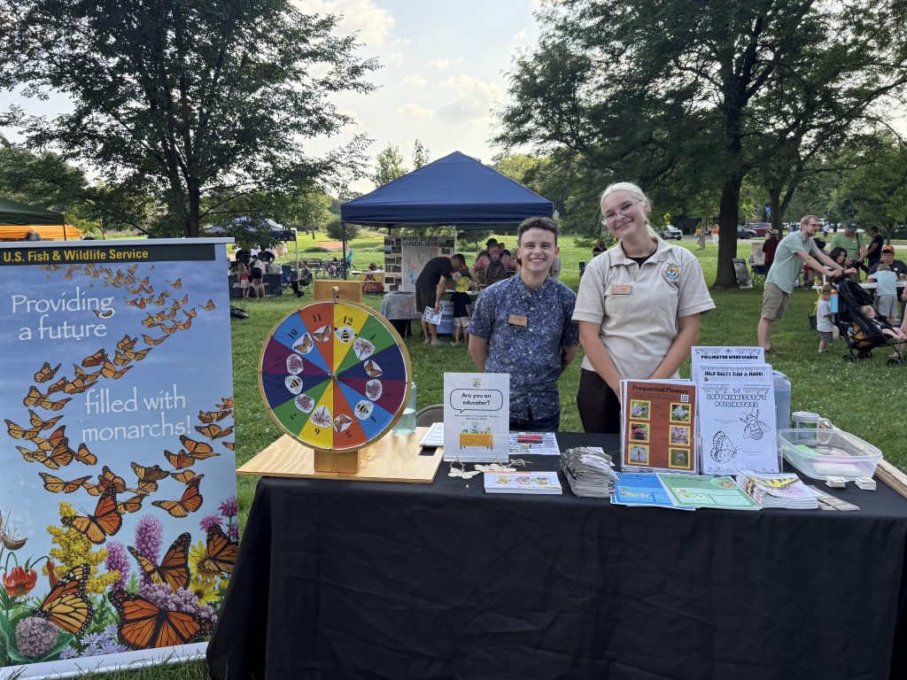 Grace and Micah at the Pollinator Party table